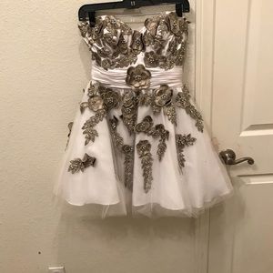 White dress with cream colored flowers